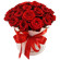 красные розы в шляпной коробке. Пакистан